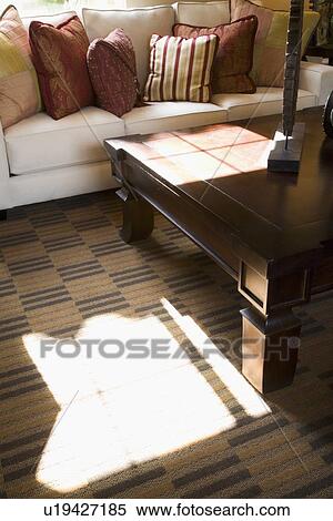 Stock Photography - Window light in traditional living room. Fotosearch
