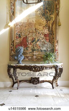Wood and marble end table in home foyer View Large Photo Image Stock Photograph - Wood and marble end table in home foyer. Fotosearch
