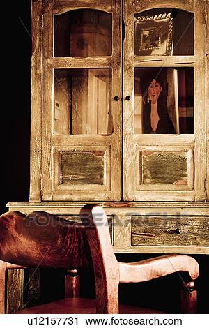 Wooden armchair and desk with cabinet View Large Photo Image Stock Image - Wooden armchair and desk with cabinet. Fotosearch