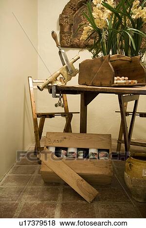 Wooden table and chairs with bar mounted cork remover View Large Photo Image Stock Photo - Wooden table and chairs with bar mounted cork remover. Fotosearch