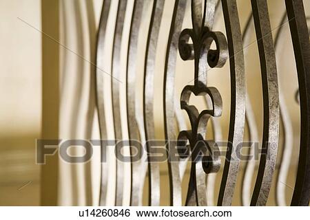Stock Photograph - Wrought iron staircase railing. Fotosearch