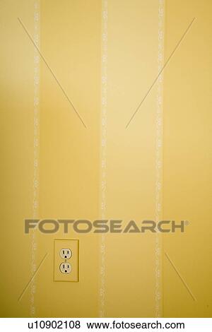 Yellow striped wall with electrical outlet View Large Photo Image Stock Photo - Yellow striped wall with electrical outlet. Fotosearch
