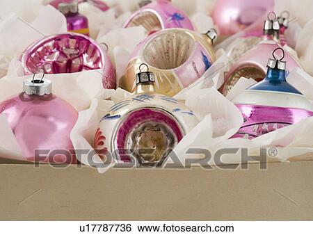 Stock Photograph - A box of Christmas ornanaments. Fotosearch