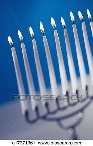 A fully lit menorah View Large Photo Image Stock Image - A fully lit menorah. Fotosearch