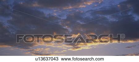 A hint of sunlight on clouds View Large Photo Image Stock Image - A hint of sunlight on clouds. Fotosearch