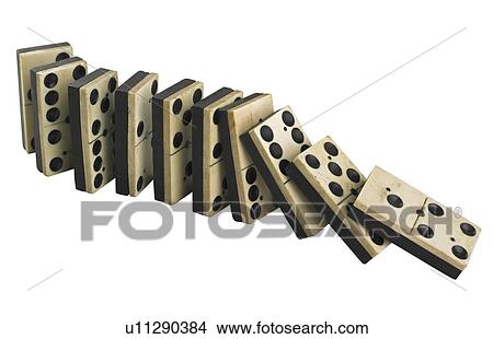 Picture - A row of falling dominos. Fotosearch