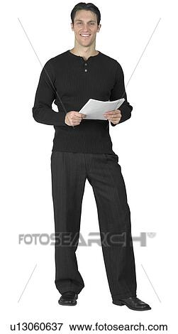 A young man holding documents View Large Photo Image Stock Photo - A young man holding documents. Fotosearch