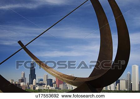 Stock Image - Adler Planetarium sundial and city skyline Chicago Illinois USA. Fotosearch