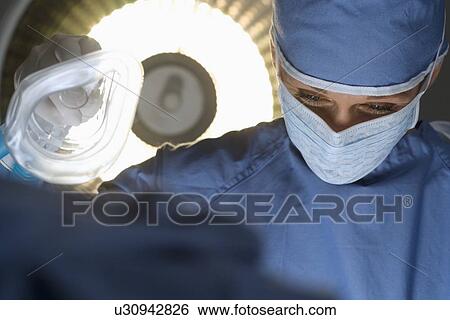 Anesthesiologist at work View Large Photo Image Stock Photograph - Anesthesiologist at work. Fotosearch
