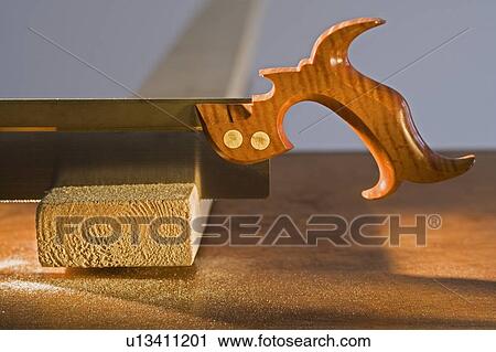 Antique saw and board View Large Photo Image Stock Image - Antique saw and board. Fotosearch