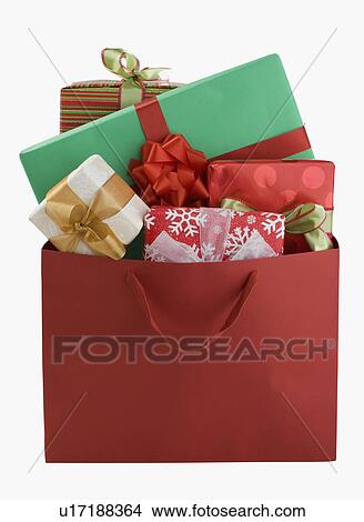 Bag filled with gifts View Large Photo Image Picture - Bag filled with gifts. Fotosearch