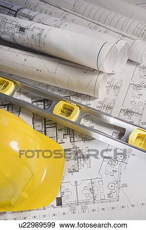 Stock Photo - Blueprints and construction items. Fotosearch
