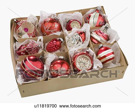Stock Image - Box of Christmas ornaments. Fotosearch