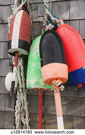 Buoys on a wall in Maine View Large Photo Image Stock Image - Buoys on a wall in Maine. Fotosearch