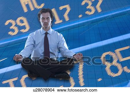 Business man meditating View Large Photo Image Picture - Business man meditating. Fotosearch