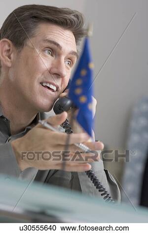 Businessman on the telephone View Large Photo Image Stock Image - Businessman on the telephone. Fotosearch