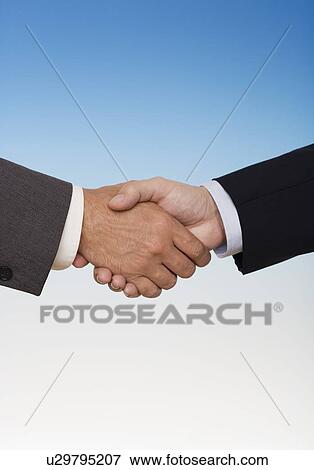 Businessmen shaking hands View Large Photo Image Stock Photo - Businessmen shaking hands. Fotosearch