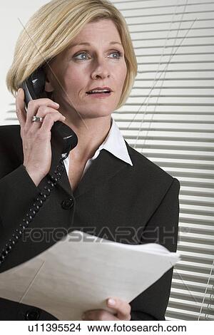 Businesswoman on the phone View Large Photo Image Picture - Businesswoman on the phone. Fotosearch
