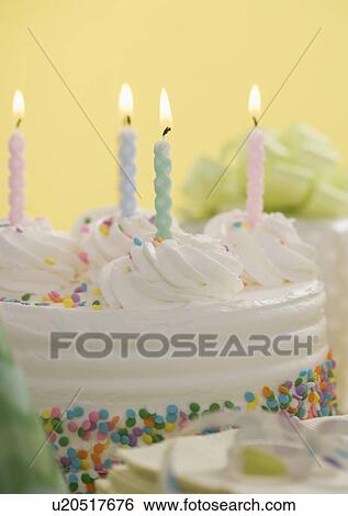 Stock Photograph - Cake and presents for special occasion. Fotosearch