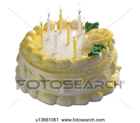 Stock Image - Cake with lit candles. Fotosearch