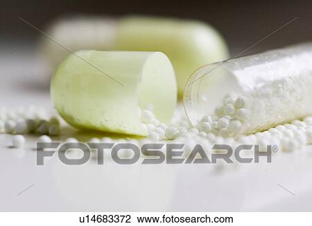Stock Image - Capsules and medication. Fotosearch