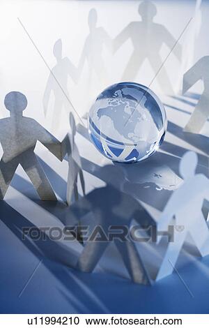 Chain of paperdoll cutouts with globe in center View Large Photo Image Stock Image - Chain of paperdoll cutouts with globe in center. Fotosearch