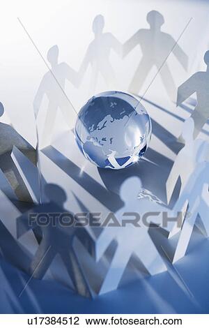 Chain of paperdoll cutouts with globe in center View Large Photo Image Stock Image - Chain of paperdoll cutouts with globe in center. Fotosearch