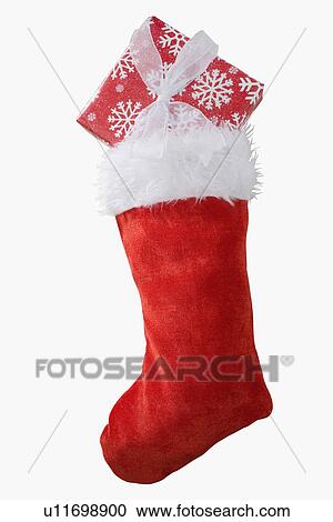 Stock Image - Christmas stocking with gift. Fotosearch