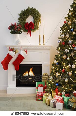 Christmas Tree With Presents And Fireplace With Stockings Stock