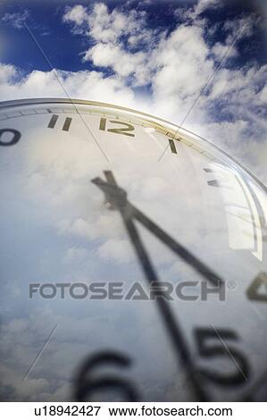 Close up of clock face and sky View Large Photo Image Stock Photo - Close up of clock face and sky. Fotosearch