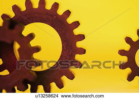 Picture - Close up of cog wheels. Fotosearch