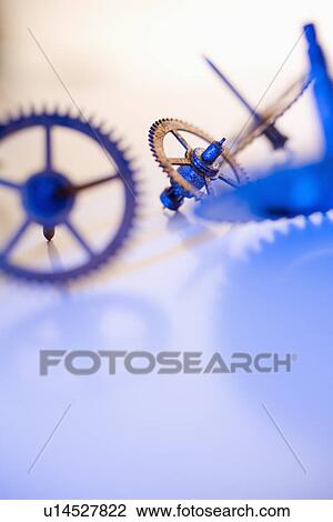 Stock Image - Close up of cog wheels. Fotosearch