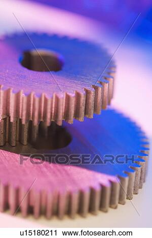 Stock Image - Close up of cog wheels. Fotosearch