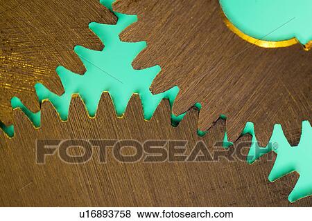 Stock Photo - Close up of cog wheels. Fotosearch