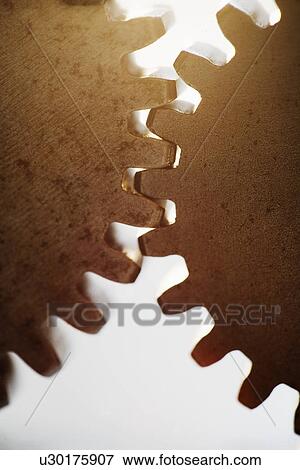 Stock Photo - Close up of cog wheels. Fotosearch