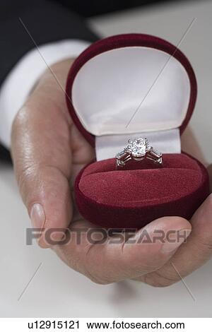 Close up of diamond ring in velvet box View Large Photo Image Stock Image - Close up of diamond ring in velvet box. Fotosearch