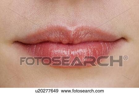 Stock Photo - Close up of female lips. Fotosearch