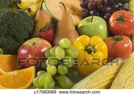 Stock Photo - Close up of fresh fruits and vegetables. Fotosearch