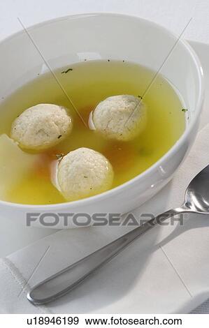 Close up of Matzah ball soup View Large Photo Image Stock Photo - Close up of Matzah ball soup. Fotosearch
