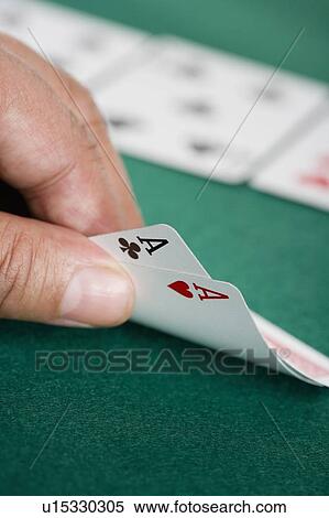 Stock Photography - Close up of pair of aces on poker table. Fotosearch