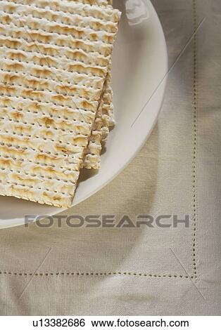 Stock Photograph - Close up of plate of Matzah. Fotosearch