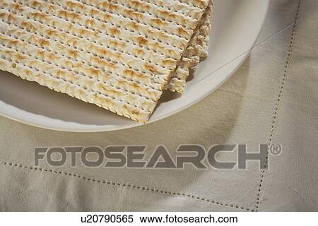 Stock Photography - Close up of plate of Matzah. Fotosearch