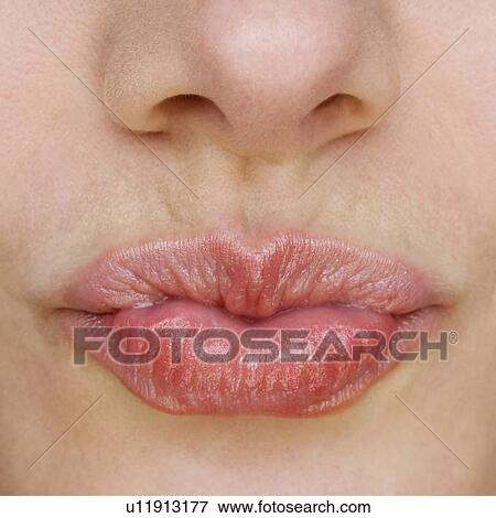 Close up of puckered lips View Large Photo Image Stock Photo - Close up of puckered lips. Fotosearch