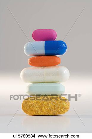 Picture - Close up of stacked pills. Fotosearch
