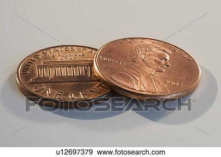 Close up of two pennies View Large Photo Image Stock Photo - Close up of two pennies. Fotosearch