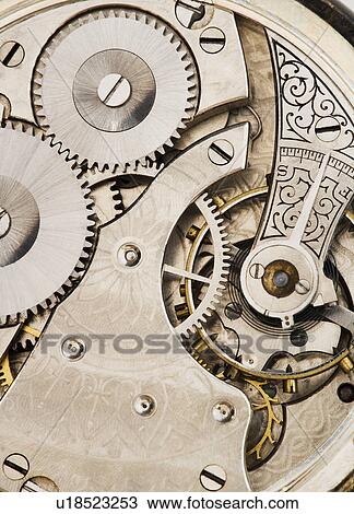 Stock Image - Close up of watch mechanism. Fotosearch