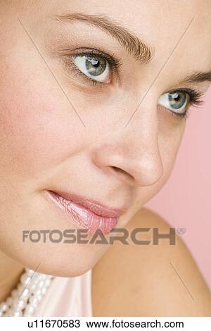 Close up of woman wearing pearls View Large Photo Image Stock Image - Close up of woman wearing pearls. Fotosearch
