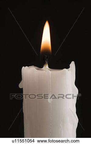 Closeup of a burning candle View Large Photo Image Picture - Closeup of a burning candle. Fotosearch