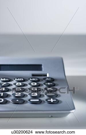 Picture - Closeup of a calculator. Fotosearch