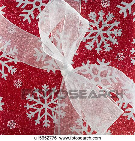 Closeup of a Christmas present View Large Photo Image Stock Photograph - Closeup of a Christmas present. Fotosearch